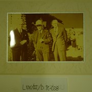 Cover image of [Norman Luxton (middle) and 2 unidentified men  in front of stone building]